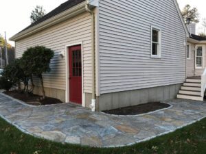 Silver Travertine pavers outside the house