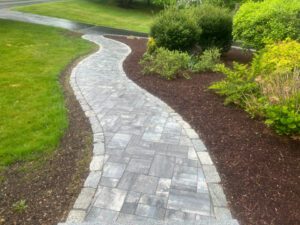 Paver walkway for the garden and lawn areas