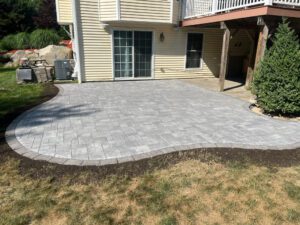 A picture of the paver patio outside the house